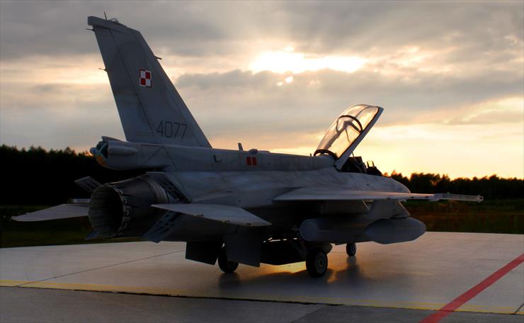 F 16 - polish f16 at rising sun.jpg